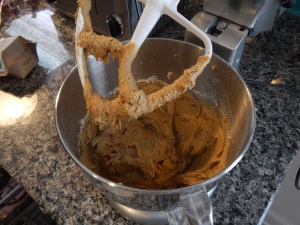 Pumpkin spice scone mixture after all ingredients added in a mixing bowl.